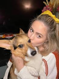 Pepper disapproves when mom includes her in taking pictures for fall