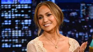 Heidi Klum Falls While Singing "Santa Baby" w/ Sal Valentinetti