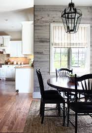 Reclaimed wood can be used to make kitchen worktops, backsplashes and dining furniture. Stick On Reclaimed Wood Walls Emily A Clark