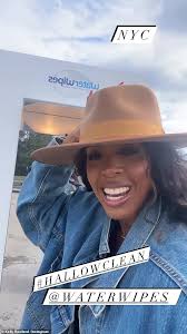 Kelly Rowland is effortlessly cool in double denim while spending time with  son Noah, two, at Harvest Festival in New York