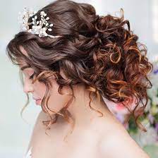 Easy long hair updos are not only classy for a special occasion but a simple fix for a bad hair day, as well. 15 Easy Curly Hair Updos You Ll Love L Oreal Paris