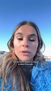 A group of people has gathered at West Town Mall in Knoxville to protest  against ICE.