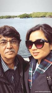 Shreya ghoshal's father, bishwajit ghoshal is an electrical engineer and works for the nuclear power corporation of india, and her mother, sarmistha ghoshal, is a shreya ghoshal with her father in childhood. Shreya Ghoshal The Melody Queen Indian Playback Singer
