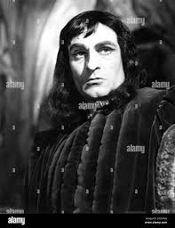 LAURENCE OLIVIER as Richard, Duke of Gloucester (after King Richard III)  Portrait by JOHN VICKERS in RICHARD THE THIRD play WILLIAM SHAKESPEARE  directed by JOHN BURRELL costumes DORIS ZINKEISEN scenery MORRIS KESTELMAN