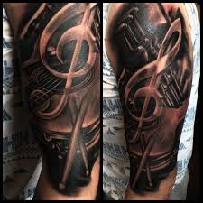 Tattoo 3d Note Mit Trommel Trommel Tattoo Musik Tattoo Ideen Tattoo Arm Mann