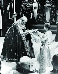 Queen elizabeth ii's coronation at westminster abbey, as seen in the smithsonian channel documentary the coronation. queen elizabeth ii, surrounded by the bishop of durham lord michael ramsay (l) and the bishop of bath and wells lord harold bradfield, walks to the altar during. Queen Elizabeth Ii S Coronation A New Elizabethan Age