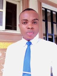 Woman making thatch roofs, a traditional practice