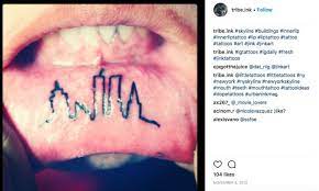 Lip Tattoos All The Bizarre Things People Get Tattooed On Their Inner Lip From Sad Kitties To Dinosaurs