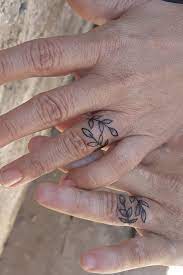 26 Sweet Wedding Ring Tattoo Ideas Tattoo Wedding Rings Ring Tattoos Wedding Band Tattoo