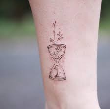Pin By Sarah Wellmann On Small Tattoos Hourglass Tattoo Small Tattoos Tiny Tattoos