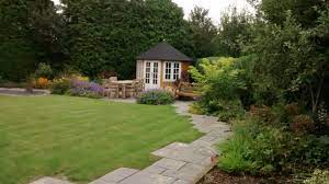 This design creates a lovely use of space with the sound of water in this medium sized garden. Medium Sized Suburban Garden Jayne Anthony Garden Design