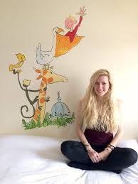 Imagine the bed right in the middle — a twin bed arranged like a daybed with a wide upholstered headboard in a solid color. An Interior Designer S Guide To Painting A Mural Ugly Duckling House