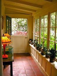 Inspiration Interior Phantasy Enclosed Porch Views And Designs Delightful Green Plants Pottery On Windows Shelves As Well As A House Design Porch Design Home