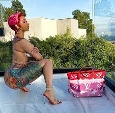 Read also actor timini egbuson breaks silence, replies lydia dj sose was born on june 5, 1981 in ibadan to a nigerian father and a hungarian mother. Cardi B Goes Pantless To Show Off Her Peacock Tattoo Makeover