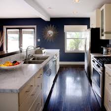 dark wood kitchen cabinets with blue