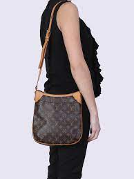 The odeon and nf are very different bags, it depends on what your needs are for the bag. Louis Vuitton Odeon Pm Monogram Canvas Luxury Bags