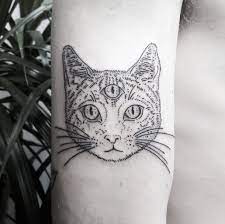 A winning tattoo sleeve for cat lovers! Three Eyed Cat Tattoo Inked On The Right Arm Eye Tattoo Cat Tattoo Animal Tattoos
