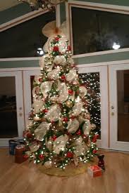 My Christmas Tree 2011 Lots Of Wide Ribbon And Large Ornaments Made It Impressive Cool Christmas Trees Christmas Decor Diy Christmas Ribbon Crafts