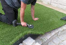 Laying Artificial Turf On Concrete Pavers Is A Simple Yet Effective Way To Give Artificial Grass Installation Installing Artificial Turf Best Artificial Grass