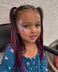 Kate's Face painting added a new...