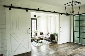 A modern farmhouse on a small lot. Add Rustic Farmhouse Decor To Your Home With Barn Doors Craft Mart