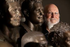 Capturing beloved faith and football heroes in bronze