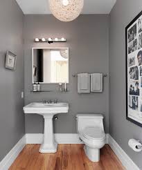 Bathroom vanity allows you to organize the cosmetics and avoid clutter. Gray Powder Room Contemporary Bathroom Skonahem