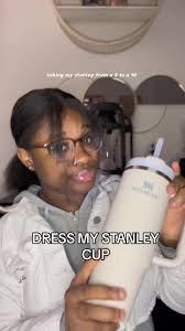 Black Lady Decorating Her Stanley Cup