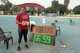 Instead of heading indoors he wrapped up and took to holding an umbrella for his rival sam kendricks as he prepared to. Women S Discus Throw Kamalpreet Kaur