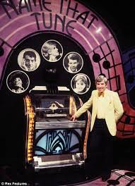 The kind of game show that likes to show you everything within the opening moments, like trademark neon titles, massive prize curtains hiding a talbot samba, some girls and a live band with grinning conductor. From 1976 Until 1983 It Was Hosted By Tom O Connor Lionel Blair Took Over From O Connor In 1984 Until The Series Was Dro Name That Tune Old Tv Shows Game Show