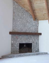 See more ideas about rock fireplaces, river rock fireplaces, fireplace design. Makeover How We Replastered Our Mountain House Stone Fireplace