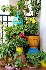 Design Decor Disha Like The Idea Of Upturned Pot To Create Level Height Small Balcony Garden Patio Furniture Makeover Apartment Garden