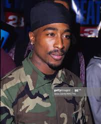 WHAT does the Classically HANDSOME Blackman look like to you????