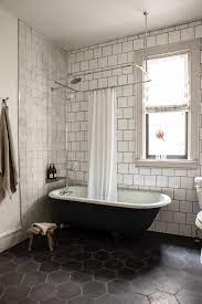 Long seen as a luxury fixture, freestanding clawfoot bathtubs are a stunning centerpiece in any bathroom. 8 Home Renovation Tips From Zio Sons Founder White Bathroom Tiles Bathroom Interior Design Bathrooms Remodel