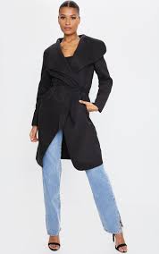 This gorgeous waterfall coat with adjustable straps will keep you hot and stylish all day long! Veronica Black Oversized Waterfall Belt Coat Prettylittlething