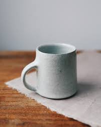 A Pristine White Mug Together With A Photograph Of The Same Vessel Being Handled To Show The Colour Of The Clay That S Beneat Mugs Crackle Glaze Ceramic Mugs
