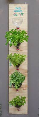 Paint all the elements in one color, fix the pots to the hooks and put the rod in the window. 25 Diy Hanging Herb Garden Ideas For Small Spaces Balcony Garden Web