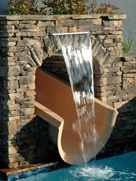 These diy pool waterfall are available in distinct models and slides from leading suppliers at affordable prices. Swimming Pool Water Slide With Stacked Stone Surround And Waterfall Hgtv