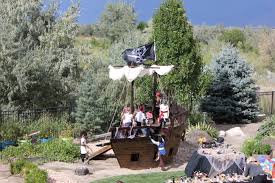 Pirate ship play house design adding fun to kids backyard ideas. Pirate Ship Playhouse