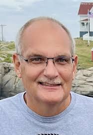 In Loving Memory of Brian R. Barrell, 64, of Rockland Township, who died  peacefully, surrounded by family in his home, Wednesday, July 31, 2024. He  was the loving husband of Keni M. (