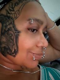 My tattoo has a purple ribbon tattoo in honor of my son Kole Harris, who  has retinitis pigmentosa! Love ya!!