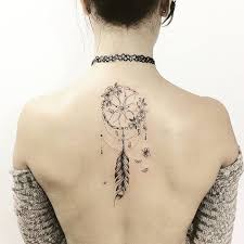 This dreamcatcher wolf tattoo is one of the best duo tattoos you will ever come across if you're looking for the perfect duo tattoo. 1001 Ideas For A Cute And Elegant Dream Catcher Tattoo