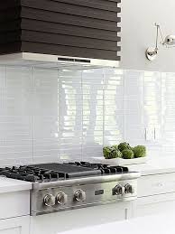 A New Take On Standard Subway Tile The Interior Collective Modern Kitchen Backsplash White Modern Kitchen Kitchen Backsplash Designs