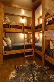 Looking for bunk room ideas? Lodge Style Bunk Room With Rustic Built In Bunk Beds Cabin Bunk Beds Bunk Beds Built In Built In Bunks
