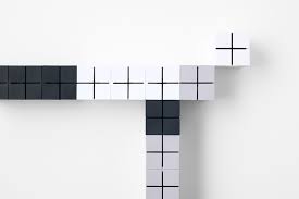 A contemporary place for umbrellas to drip. Meji Nendo