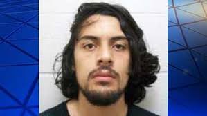 Police: Man tried to rob driver waiting at stop light