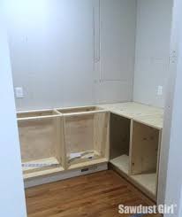 One possibility is to leave the corner open and fill it. Diy Corner Cabinet With No Wasted Space Sawdust Girl