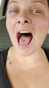 How long should I wait before changing my tongue piercing?