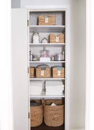 Have a closet with wire shelving? Amazing Before And After Linen Closet Makeover Helpful Organization Tips