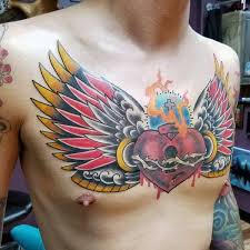 Beautifully written words line the leftmost shoulder blade, while a half wing with each feather finely detailed and bolder towards the tip is gracefully curved on the rightmost chest. Top 39 Wing Chest Tattoo Ideas 2021 Inspiration Guide